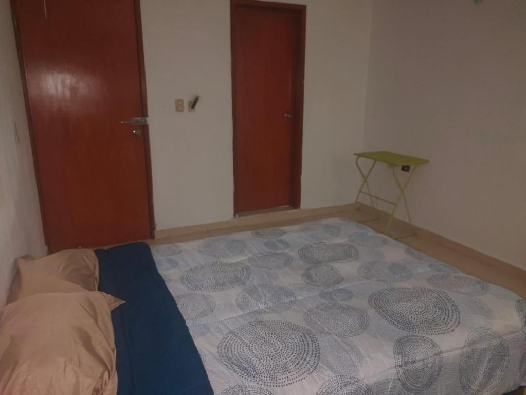 Postel nebo postele na pokoji v ubytování CASA CORAZA