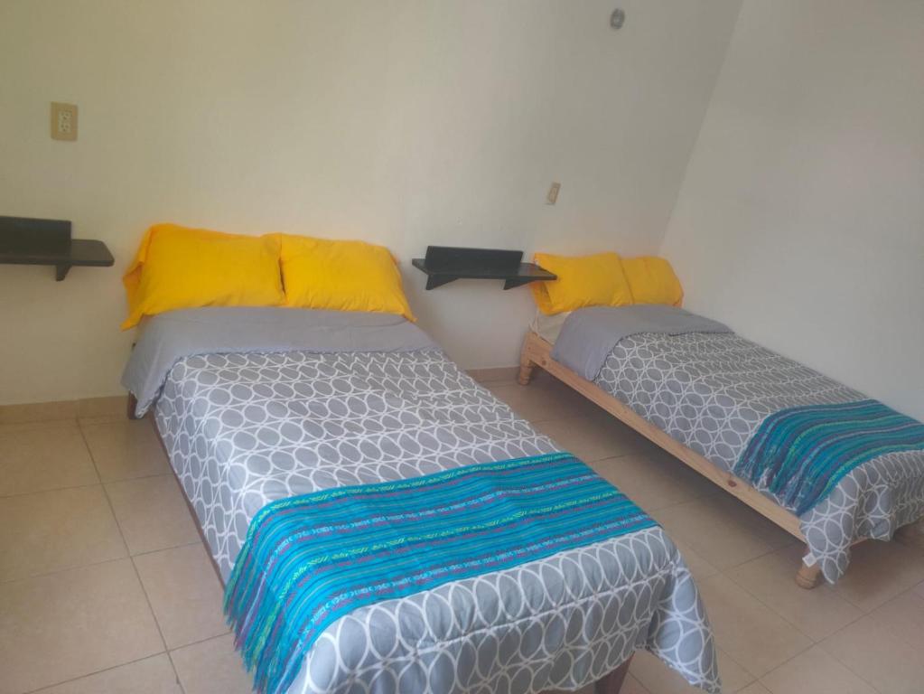 Postel nebo postele na pokoji v ubytování CASA CORAZA