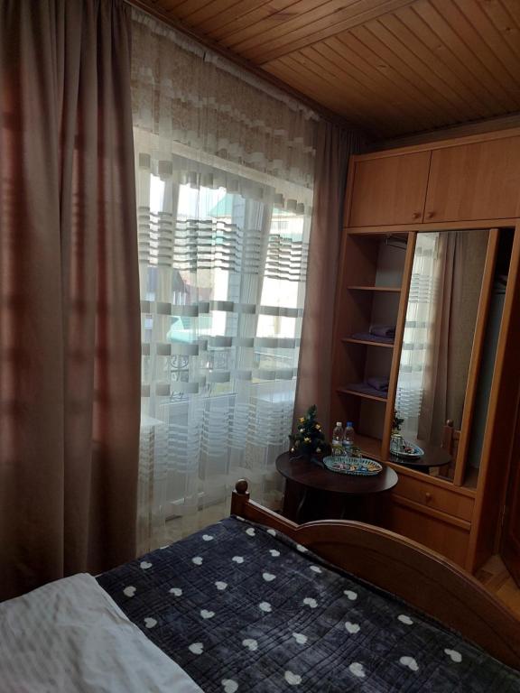 Postel nebo postele na pokoji v ubytování Садиба Маковиця