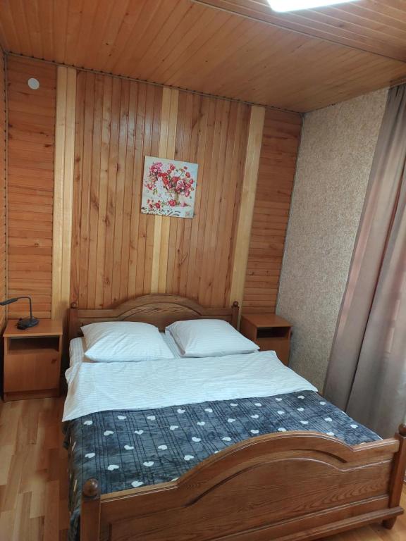 Postel nebo postele na pokoji v ubytování Садиба Маковиця