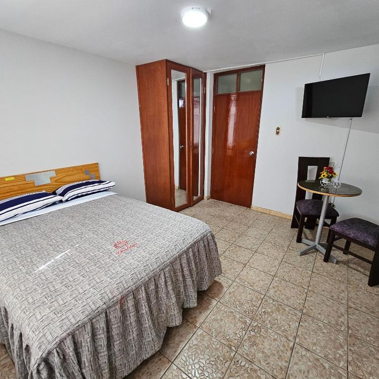 Voodi või voodid majutusasutuse Hotel Guadalupe toas