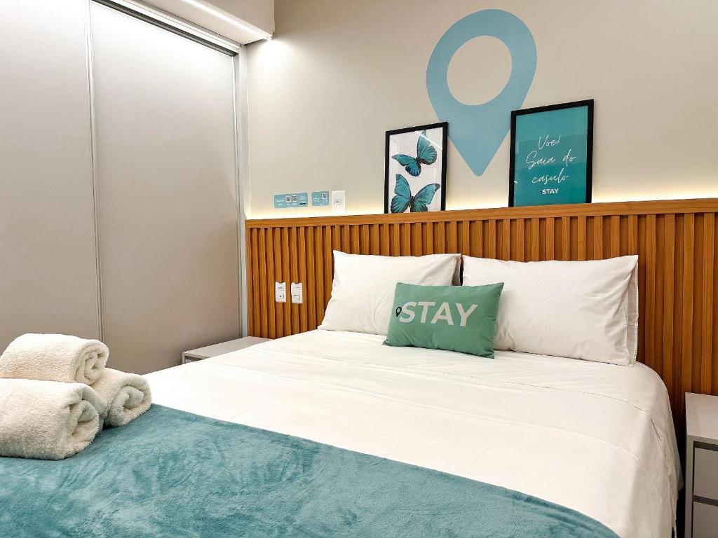 a bedroom with a bed with a stay pillow on it at STAY Blend SmartStyle in Goiânia