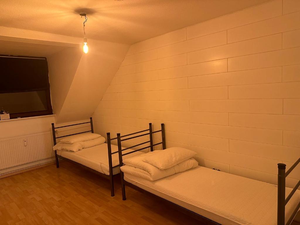 Postel nebo postele na pokoji v ubytování Pauli Hostel