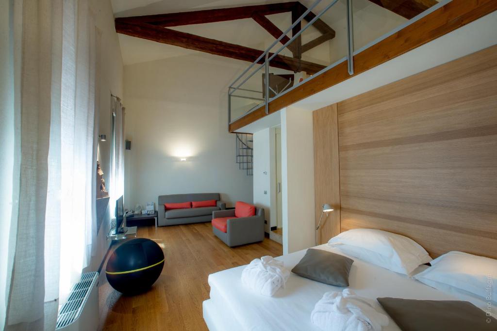 Postel nebo postele na pokoji v ubytování Hotel Annunziata
