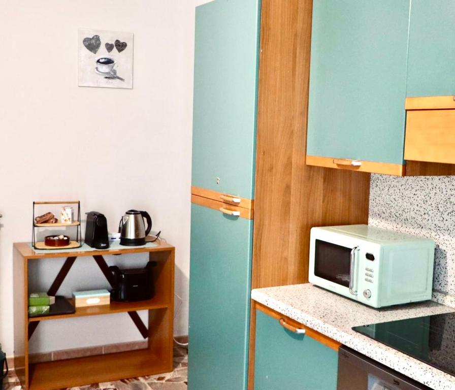 Kuchyň nebo kuchyňský kout v ubytování Gurej Casa Vacanze