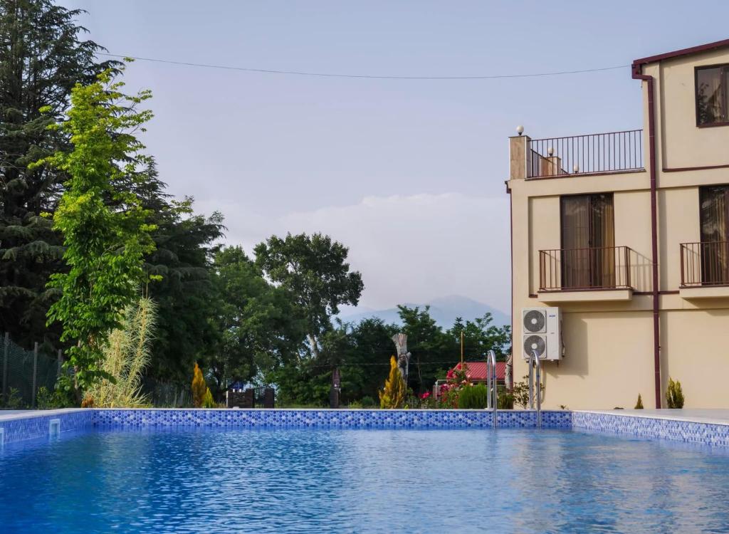 Bazén v ubytování Kisi Garden Hotel nebo v jeho okolí