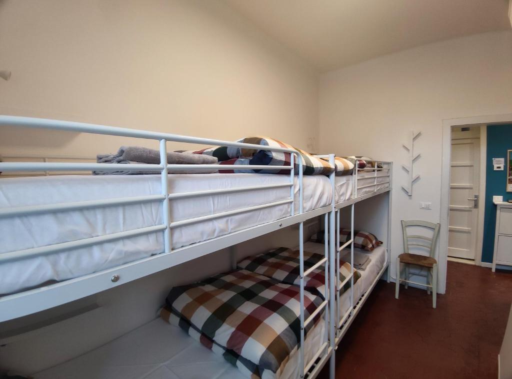 Postel nebo postele na pokoji v ubytování BBConegliano Bixio