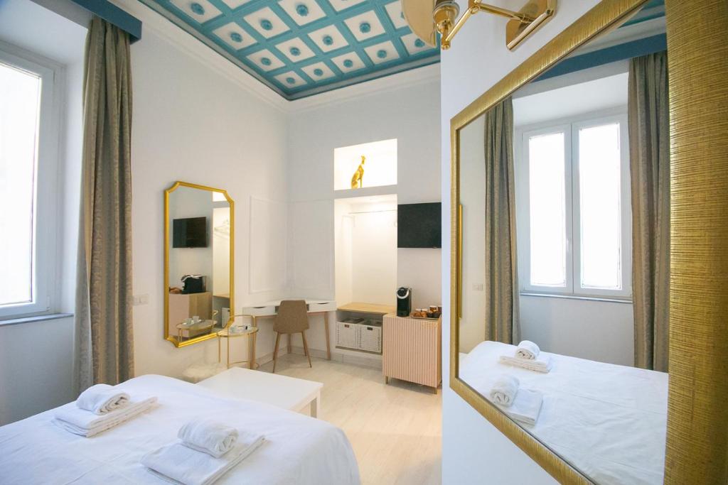 Llit o llits en una habitació de Caffe' e Cuscino