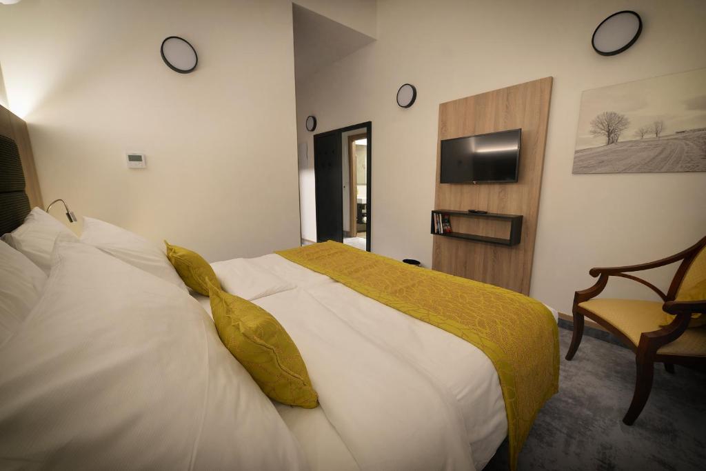 Łóżko lub łóżka w pokoju w obiekcie Vysocina Design Apartments