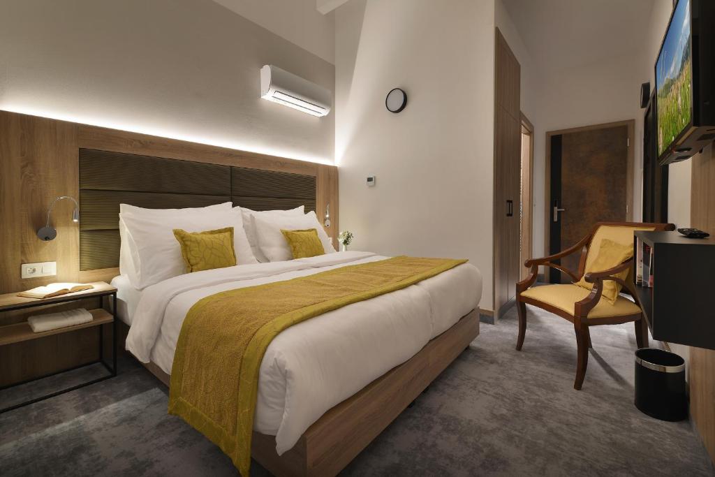 Telewizja i/lub zestaw kina domowego w obiekcie Vysocina Design Apartments