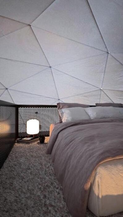 Rúm í herbergi á Glamping Špindl One&Only