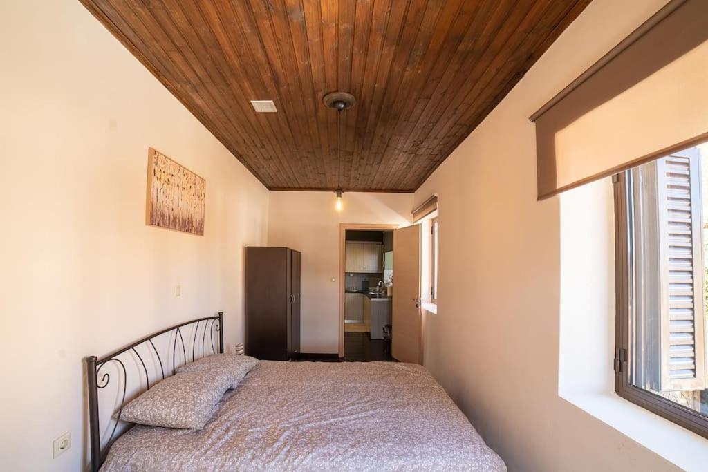 Llit o llits en una habitaci&oacute; de Valtesiniko View
