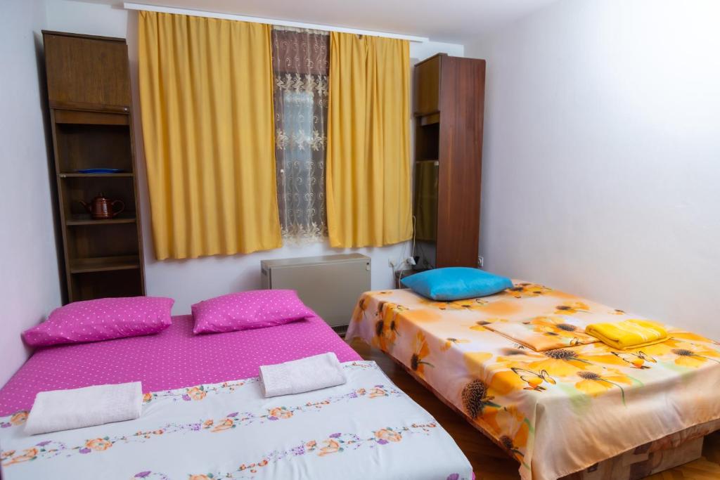 Postel nebo postele na pokoji v ubytování Apartment Bojke