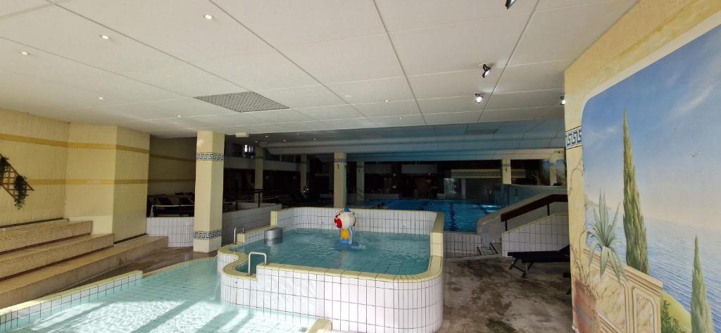 Posezení v ubytování Sauna, Pool und Gartenzugang