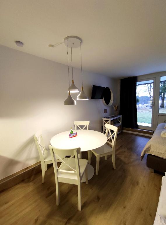 Posezení v ubytování Sauna, Pool und Gartenzugang