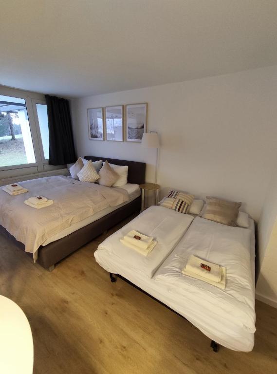 Postel nebo postele na pokoji v ubytování Sauna, Pool und Gartenzugang