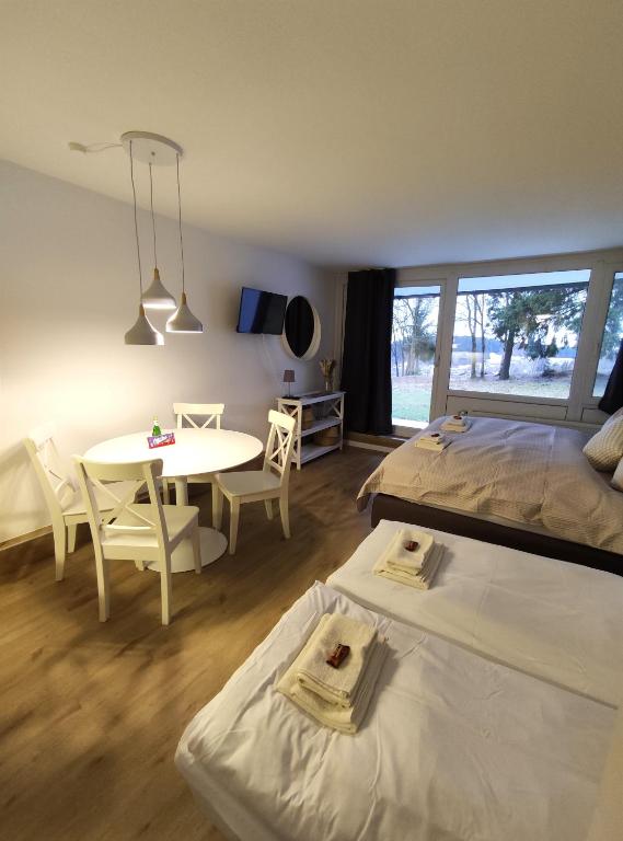 Postel nebo postele na pokoji v ubytování Sauna, Pool und Gartenzugang