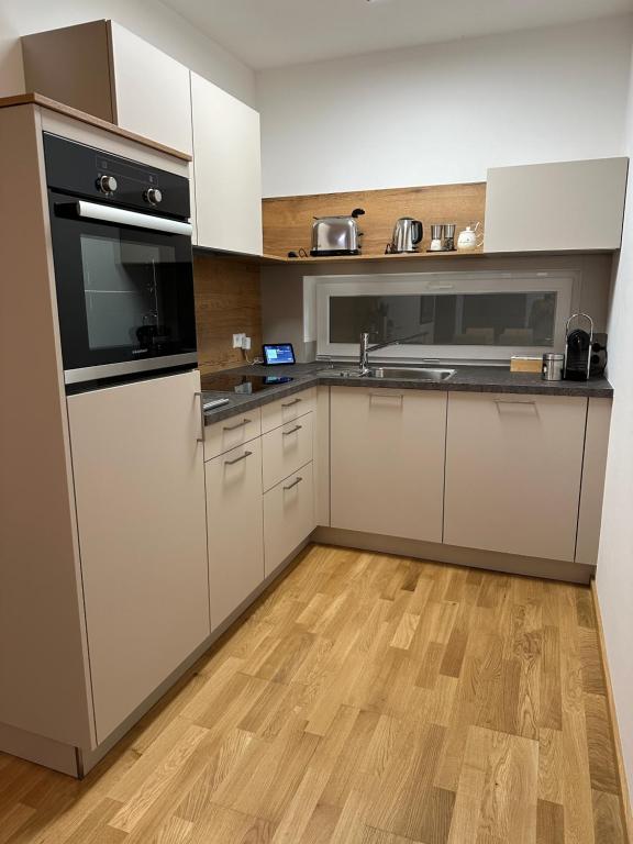 Kuchyň nebo kuchyňský kout v ubytování Harmony Living - 10 min to Graz