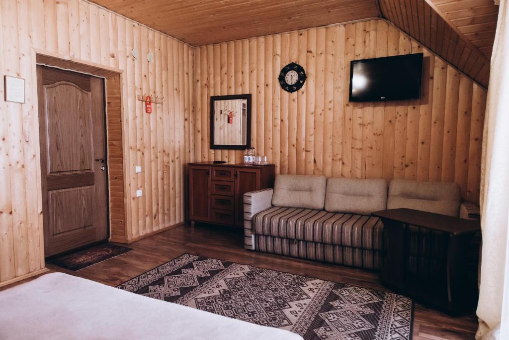 Postel nebo postele na pokoji v ubytování Новий