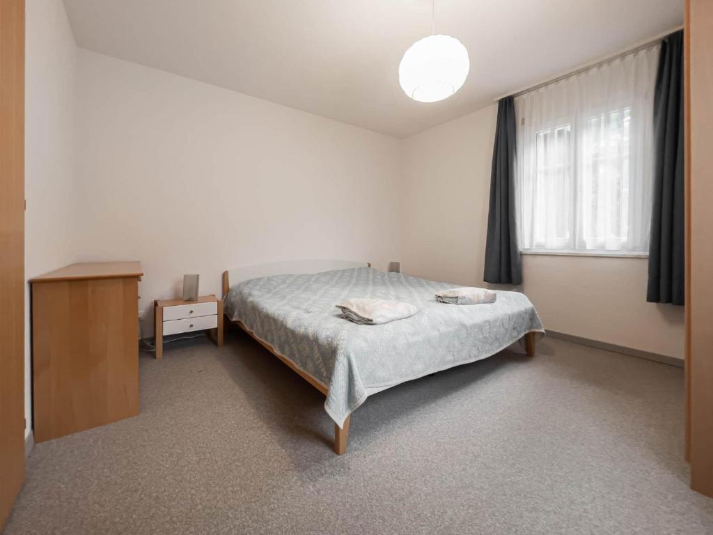 Postel nebo postele na pokoji v ubytování Chalet Wassermandli