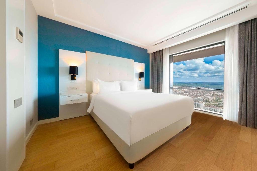 Radisson Residences Avrupa TEM Istanbulにあるベッド