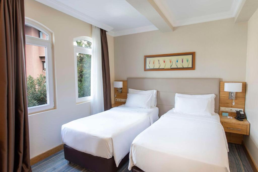 A bed or beds in a room at Radisson Hotel Istanbul Sultanahmet
