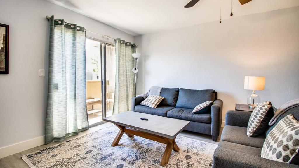 a living room with a couch and a coffee table at Contemporary Condo in Hub of Old Town Scottsdale in Scottsdale