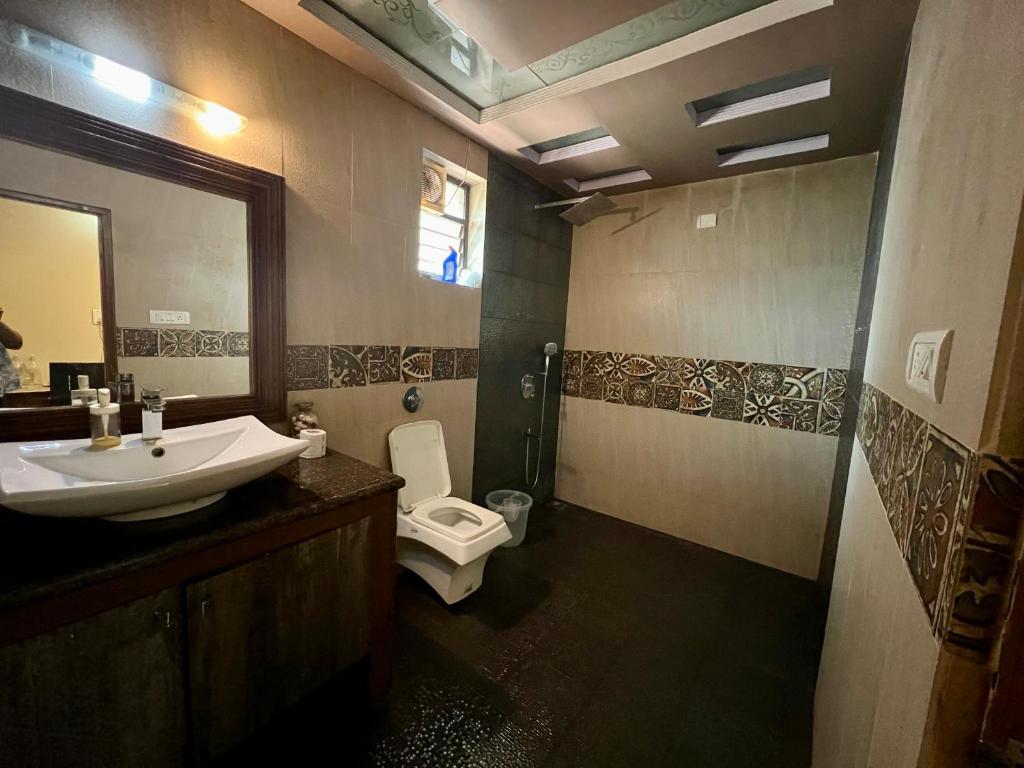 Koupelna v ubytování Fernandes Homestay- Amor