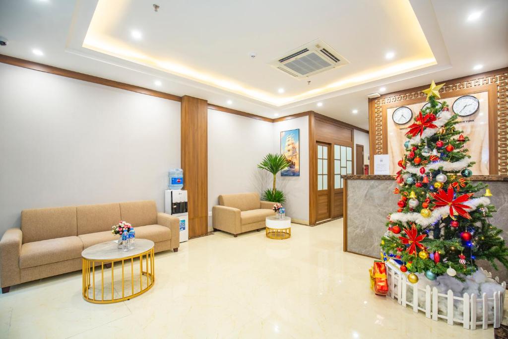 a christmas tree in the lobby of a hospital at Sumitomo 15 Apartment - No 27 Lane 39 Linh Lang Street in Hanoi