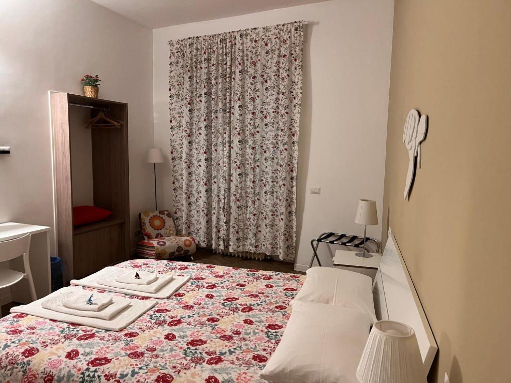 Posteľ alebo postele v izbe v ubytovaní B&B Via Fontana Milano