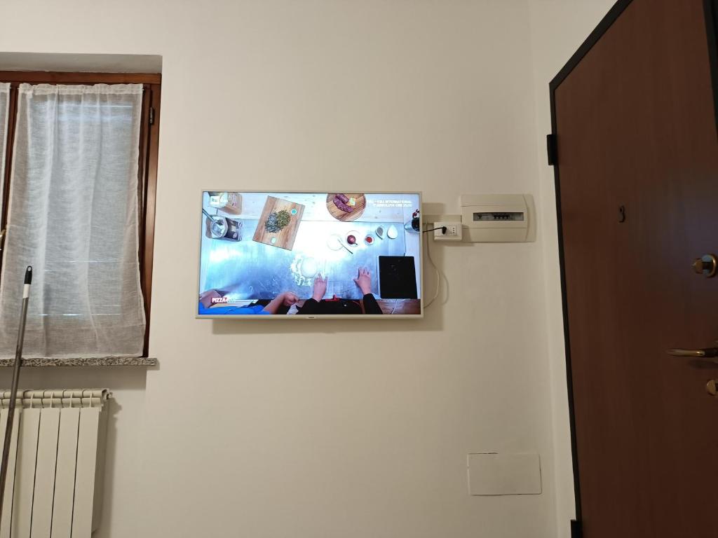 TV a/nebo společenská místnost v ubytování Matteotti 21 bis