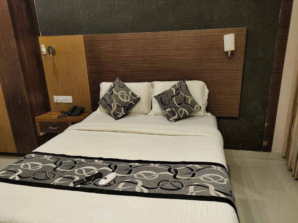 Postel nebo postele na pokoji v ubytování Santhi Bhavan, Chennai Central