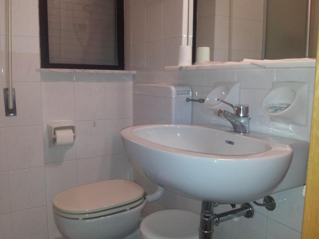 Koupelna v ubytování Hotel Montecarlo