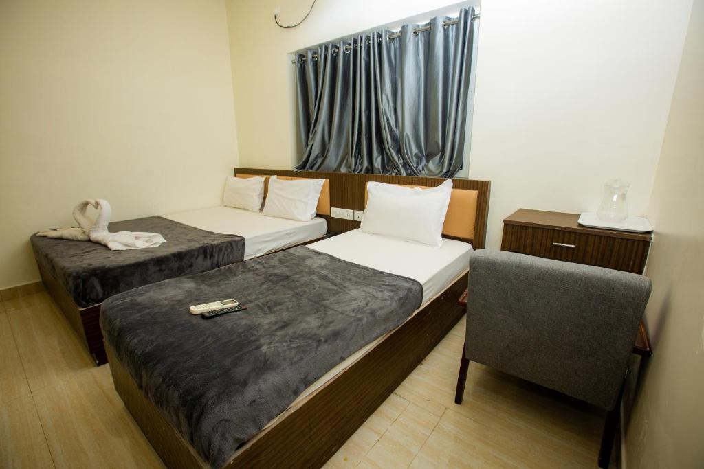 Postel nebo postele na pokoji v ubytování THE PARK AVENUE HOTEL - Business Class Hotel Near Central Railway Station Chennai Periyamet