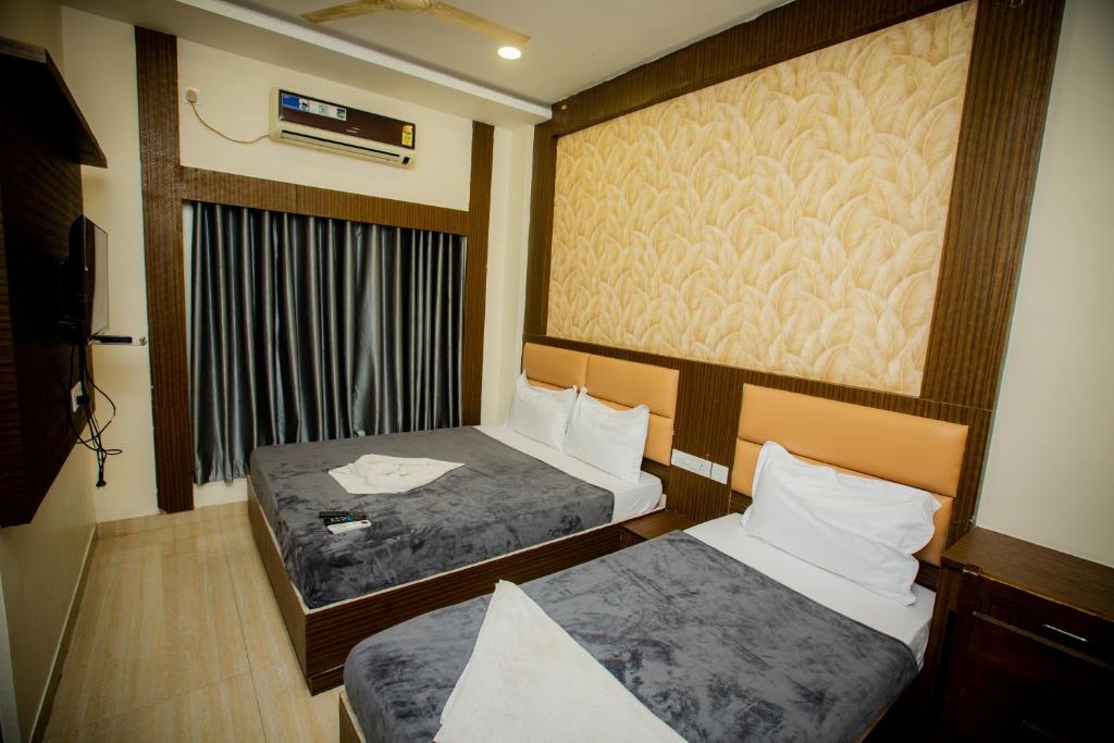 Postel nebo postele na pokoji v ubytování THE PARK AVENUE HOTEL - Business Class Hotel Near Central Railway Station Chennai Periyamet