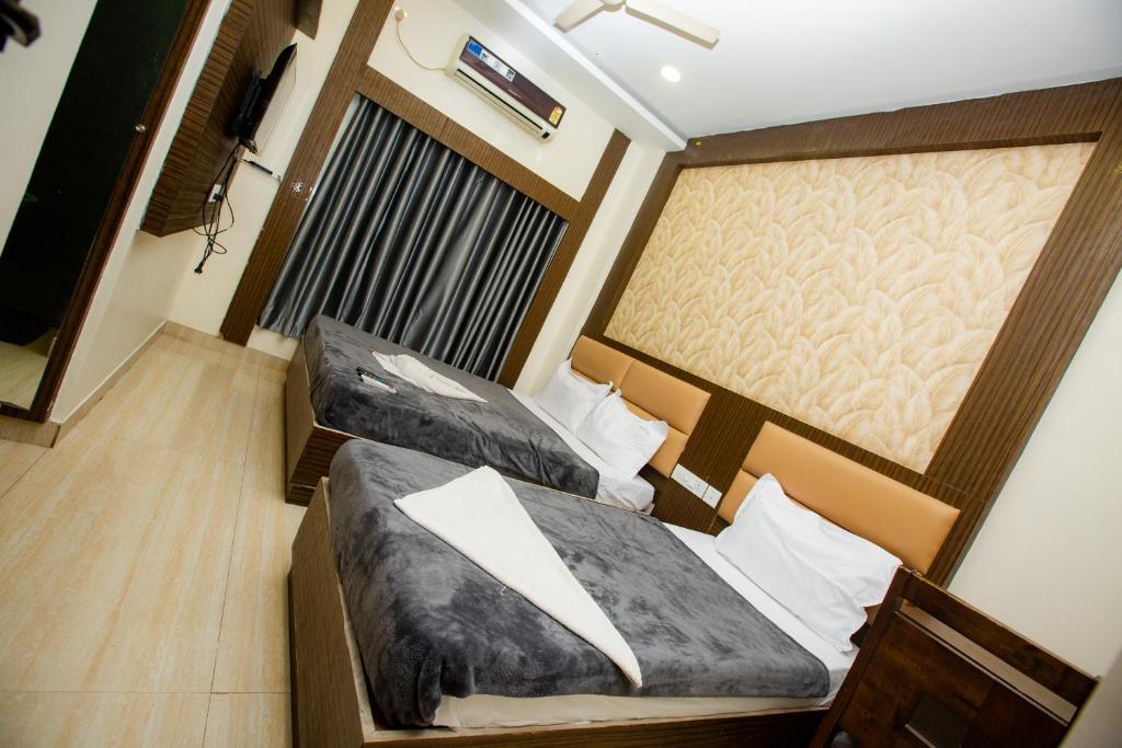 Postel nebo postele na pokoji v ubytování THE PARK AVENUE HOTEL - Business Class Hotel Near Central Railway Station Chennai Periyamet