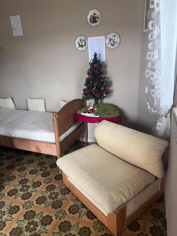 Postel nebo postele na pokoji v ubytování Villa L'Ottagono con cucina parcheggio privato telecamerizzato e wifi