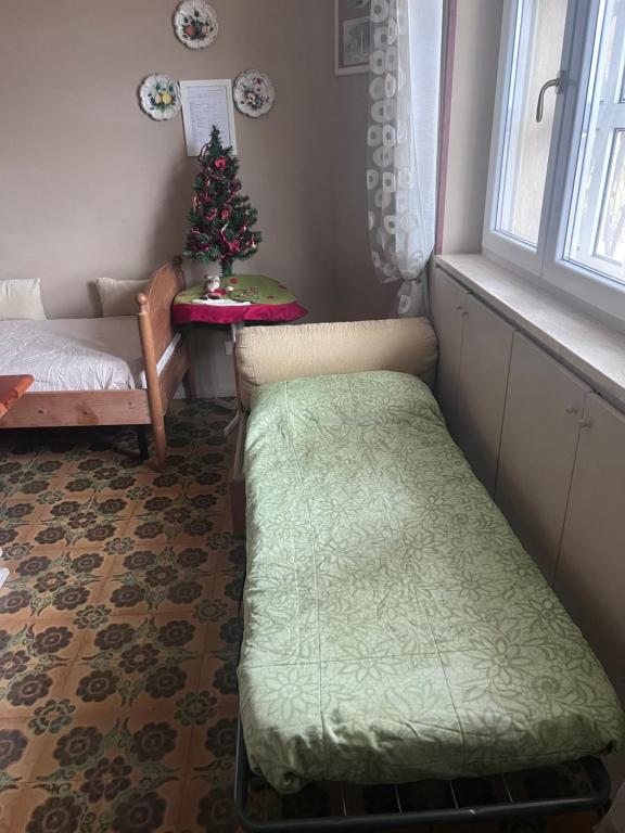Postel nebo postele na pokoji v ubytování Villa L'Ottagono con cucina parcheggio privato telecamerizzato e wifi