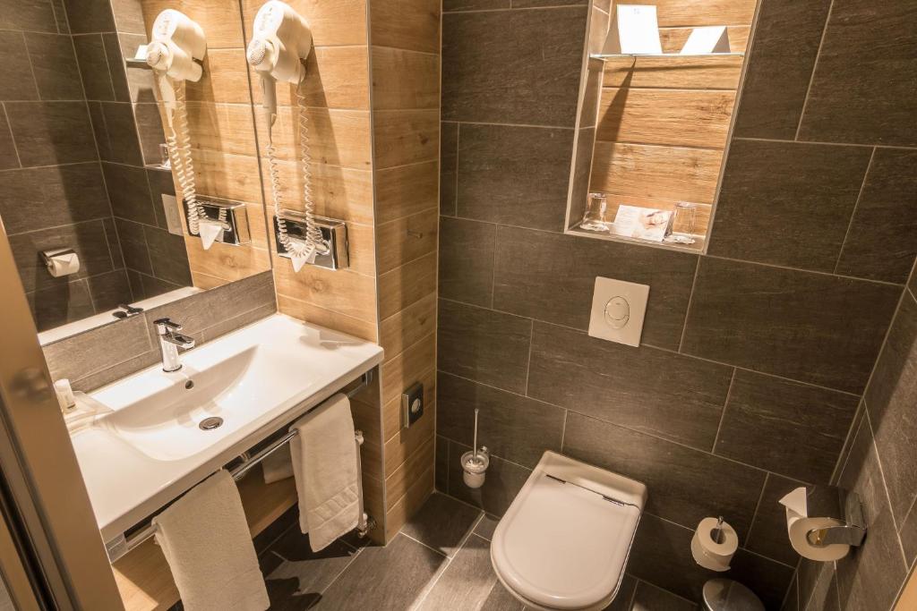 Koupelna v ubytování Holiday Inn Budapest-Budaörs by IHG
