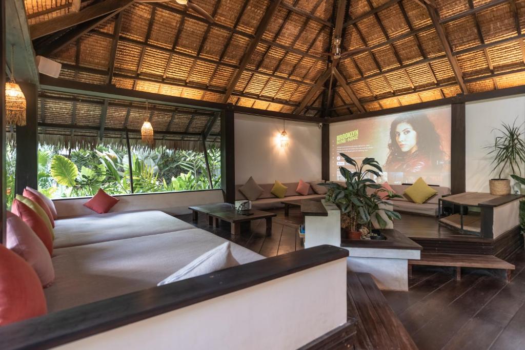 Postel nebo postele na pokoji v ubytování kawayan villa siargao