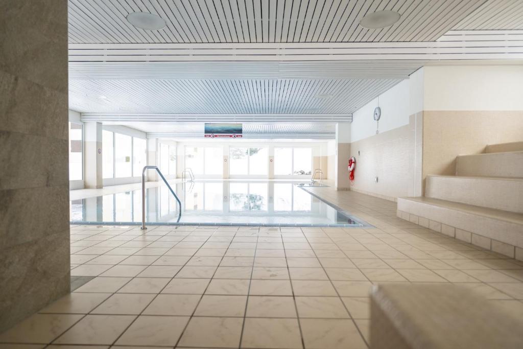 Bazén v ubytování Brentschpark Wohnung 72 nebo v jeho okolí