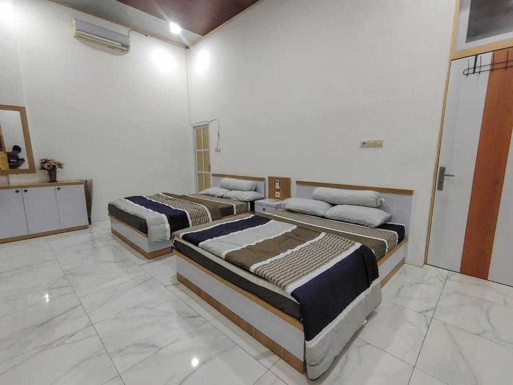 Java Mulia Homestay Syariah - Deluxe Double Or Twin Room With Balcony