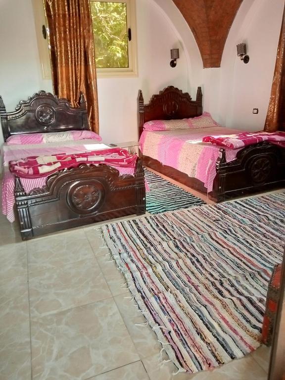 Postel nebo postele na pokoji v ubytování El Prince Guesthouse