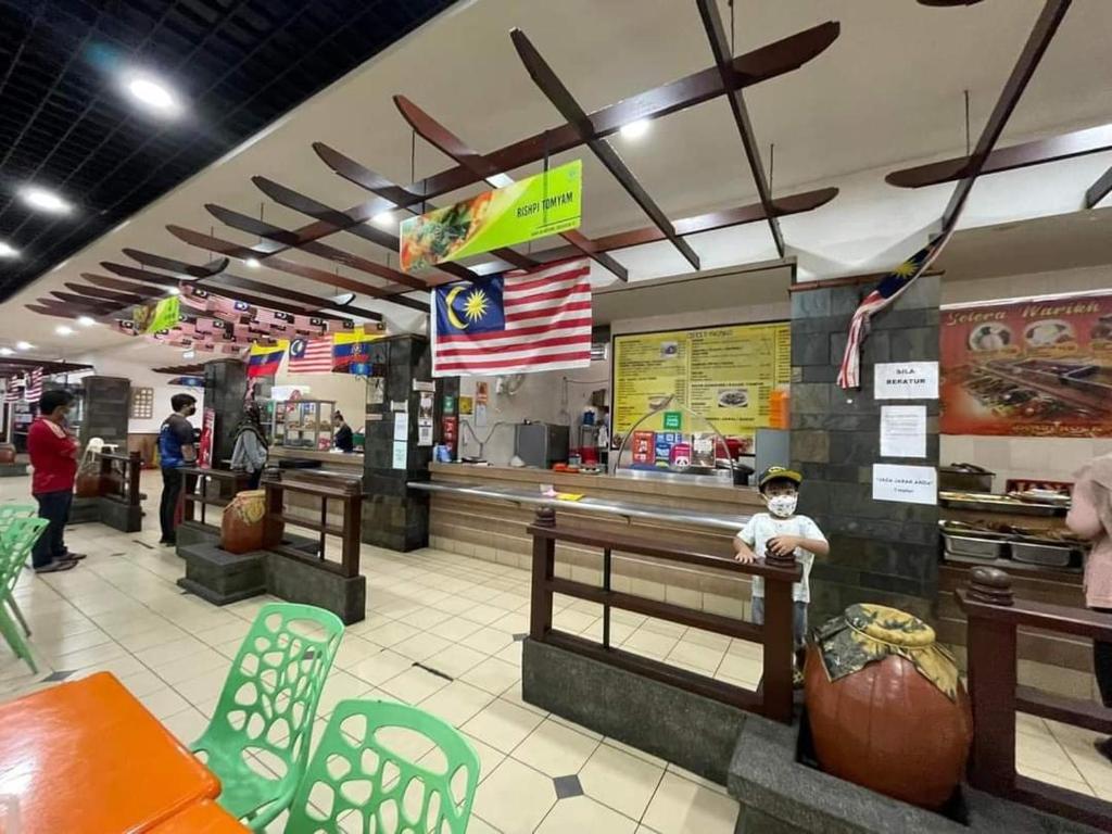 Restaurace v ubytování HomeStay D 11 Putrajaya NETFLIX WIFI