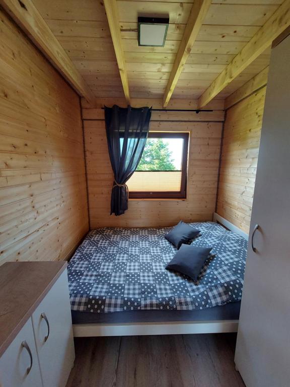 Postel nebo postele na pokoji v ubytování Rodzinna Przystań