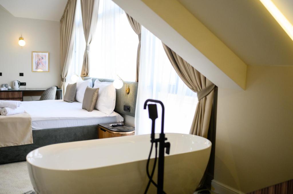 Krevet ili kreveti u jedinici u okviru objekta Hotel Bohemian Garni - Skadarlija