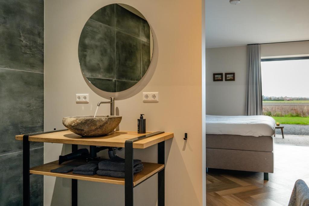 Postel nebo postele na pokoji v ubytování B&B de Cley