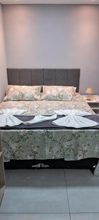 Katil atau katil-katil dalam bilik di Pousada Canoa dos Anjos suítes