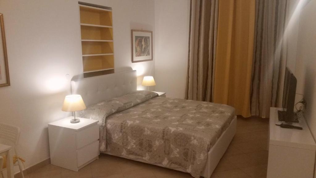Postel nebo postele na pokoji v ubytování Tortugas B&B