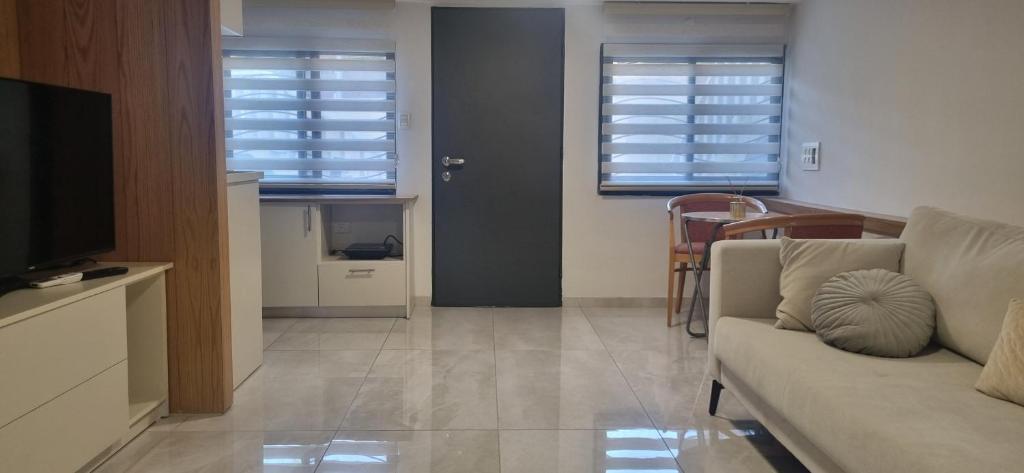 TV a/nebo společenská místnost v ubytování studio apartment